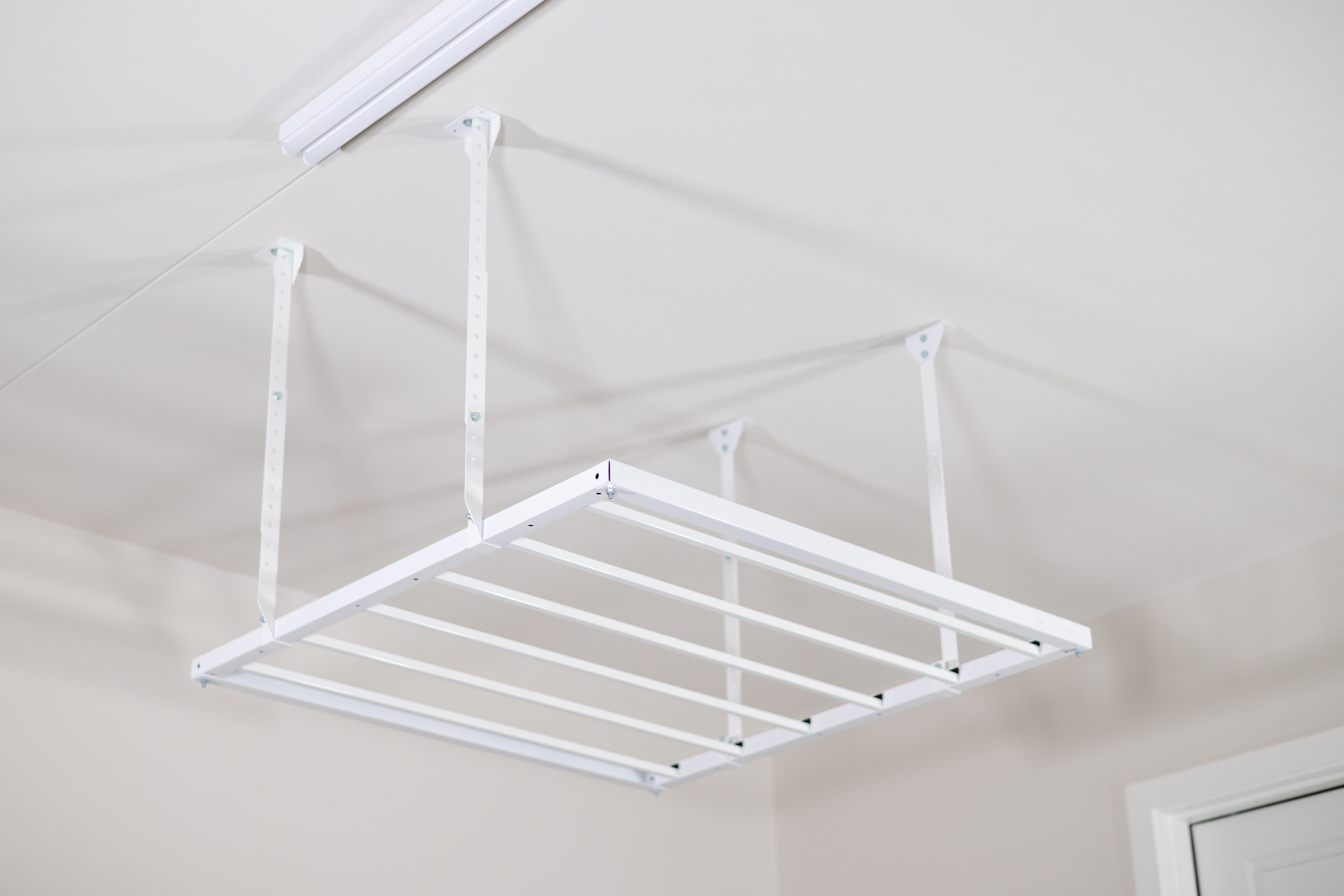 Ceiling-Mounted Sliding Storage | Ceiling SAM® – CeilingSAM